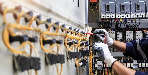 Professional Electrician technician working in Plano, KY
